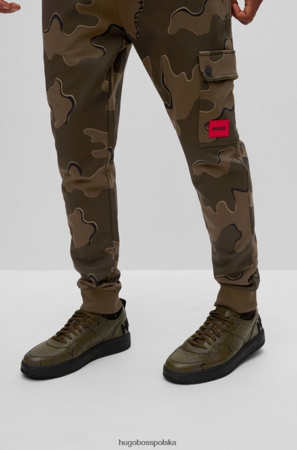 Hugo Boss Spodnie dresowe hugo cargo z bawełny z nadrukiem w kamuflaż w kolorze zielonym zielone wzorzyste R0X0H62537
