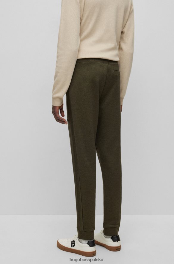 Hugo Boss Spodnie dresowe hugo w kolorze ciemnozielonym z merceryzowanej bawełny z gumowanym logo ciemnozielony R0X0H63554
