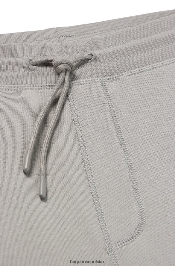 Hugo Boss Spodnie dresowe hugo z bawełny frotte i szarą naszywką z logo szary R0X0H61438