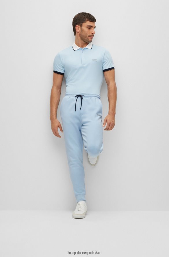 Hugo Boss Spodnie dresowe hugo z mieszanki bawełny z wielokolorowymi paskami w kolorze jasnoniebieskim jasny niebieski R0X0H61733