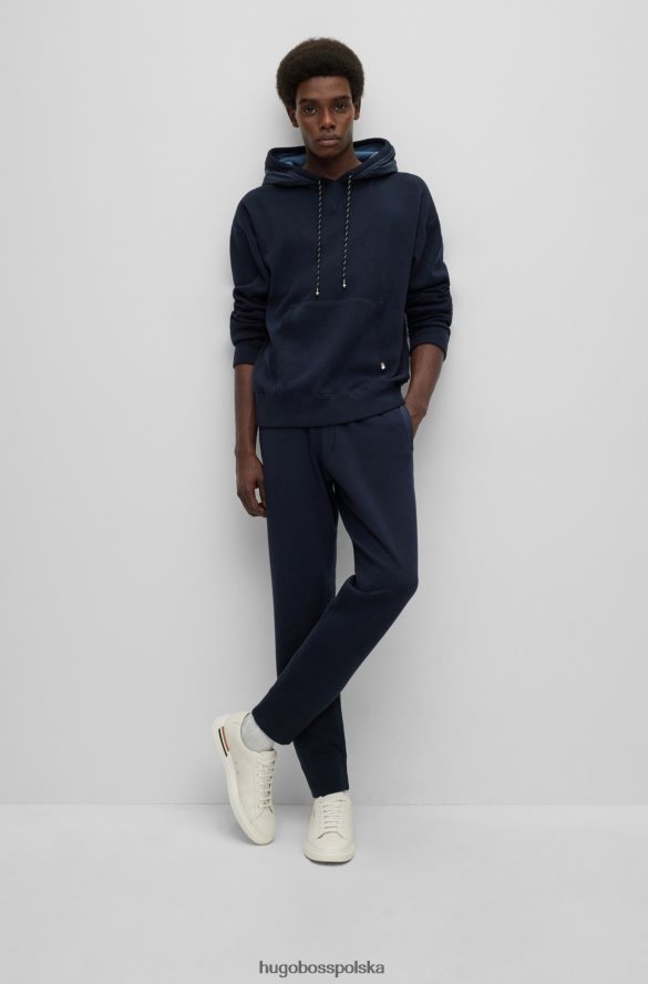 Hugo Boss Spodnie dresowe o regularnym kroju z bawełny i dziewiczej wełny hugo w kolorze ciemnoniebieskim ciemny niebieski R0X0H62866