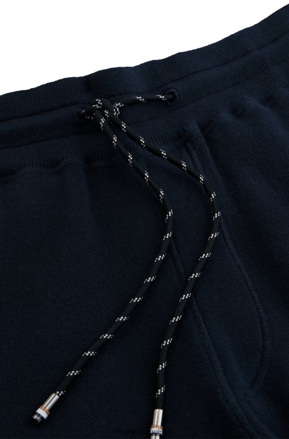 Hugo Boss Spodnie dresowe o regularnym kroju z bawełny i dziewiczej wełny hugo w kolorze ciemnoniebieskim ciemny niebieski R0X0H62866