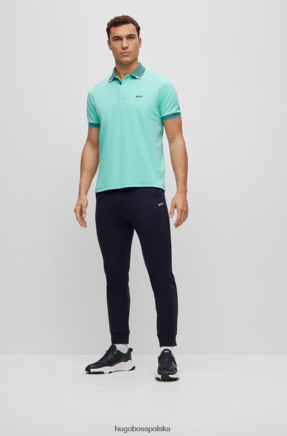 Hugo Boss Spodnie dresowe o regularnym kroju z wielobarwnymi logo hugo w kolorze granatowym ciemny niebieski R0X0H63528