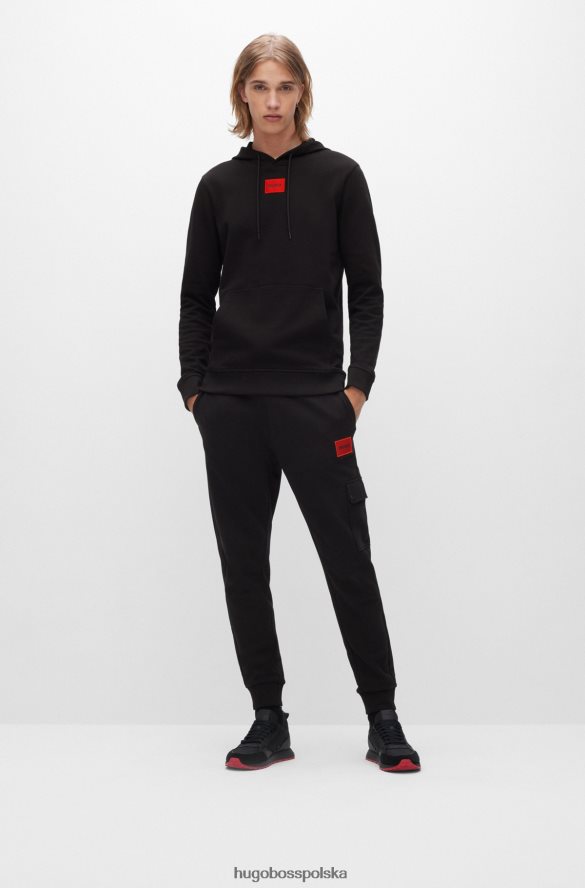 Hugo Boss Spodnie dresowe o swobodnym kroju z bawełny frotte i kieszenią cargo, czarne hugo czarny R0X0H62166