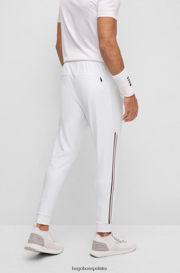 Hugo Boss Spodnie dresowe x Matteo Berrettini z logo i charakterystycznymi paskami i mankietami u dołu biały R0X0H64411