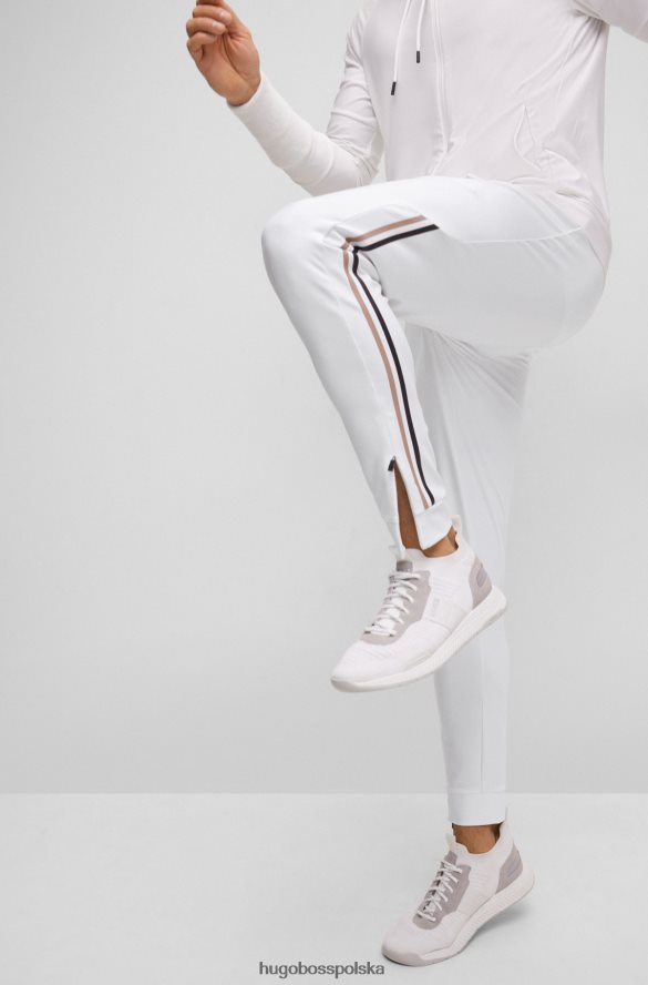 Hugo Boss Spodnie dresowe x Matteo Berrettini z logo i charakterystycznymi paskami i mankietami u dołu biały R0X0H64411