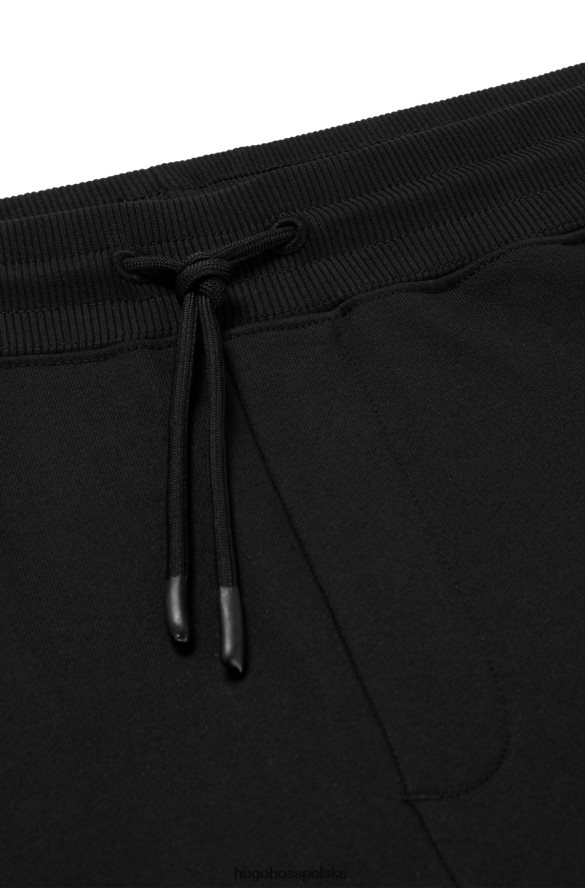 Hugo Boss Spodnie dresowe z bawełnianej froty z logo Hugo w kolorze czarnym czarny R0X0H63350