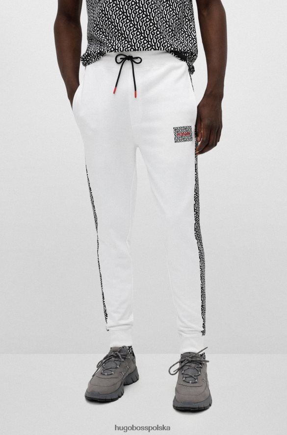 Hugo Boss Spodnie dresowe z bawełnianej froty z naszywką z logo i wstawkami hugo białe biały R0X0H62572