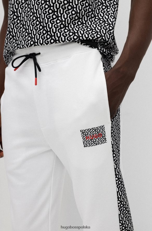 Hugo Boss Spodnie dresowe z bawełnianej froty z naszywką z logo i wstawkami hugo białe biały R0X0H62572