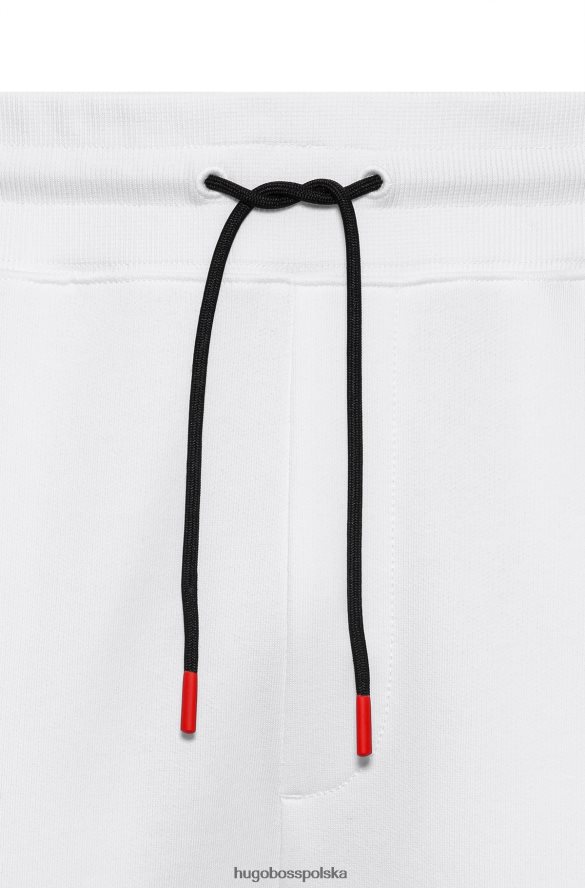 Hugo Boss Spodnie dresowe z bawełnianej froty z naszywką z logo i wstawkami hugo białe biały R0X0H62572