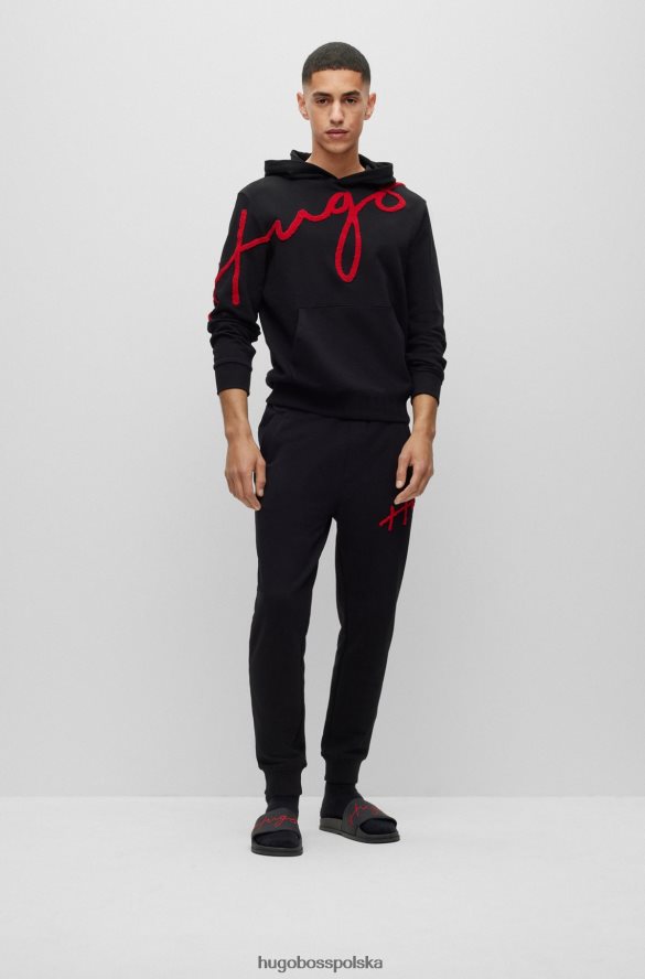 Hugo Boss Spodnie dresowe z bawełnianej froty z odręcznym haftem logo, czarne hugo czarny R0X0H63550