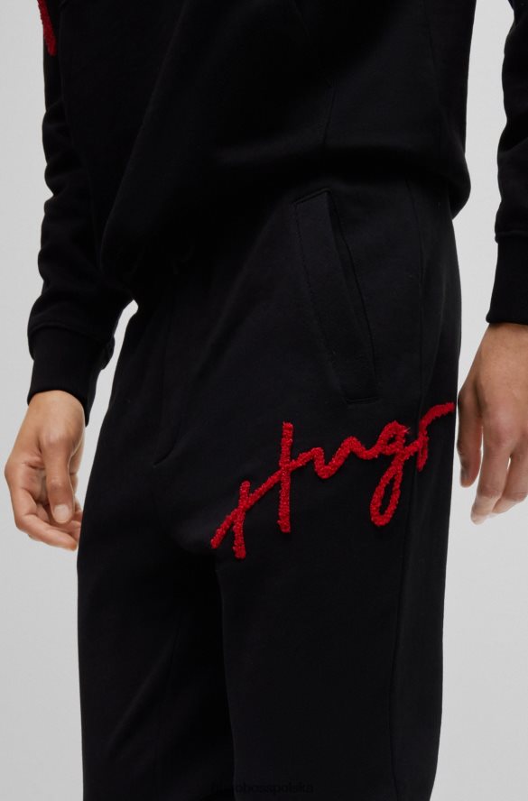 Hugo Boss Spodnie dresowe z bawełnianej froty z odręcznym haftem logo, czarne hugo czarny R0X0H63550
