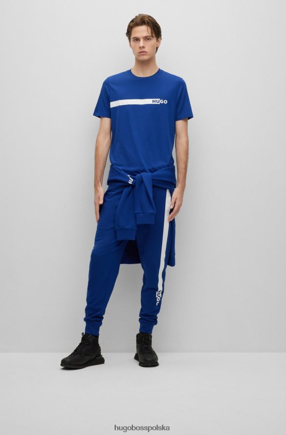 Hugo Boss Spodnie dresowe z bawełny frotte z grafiką z logo Hugo Blue niebieski R0X0H61953
