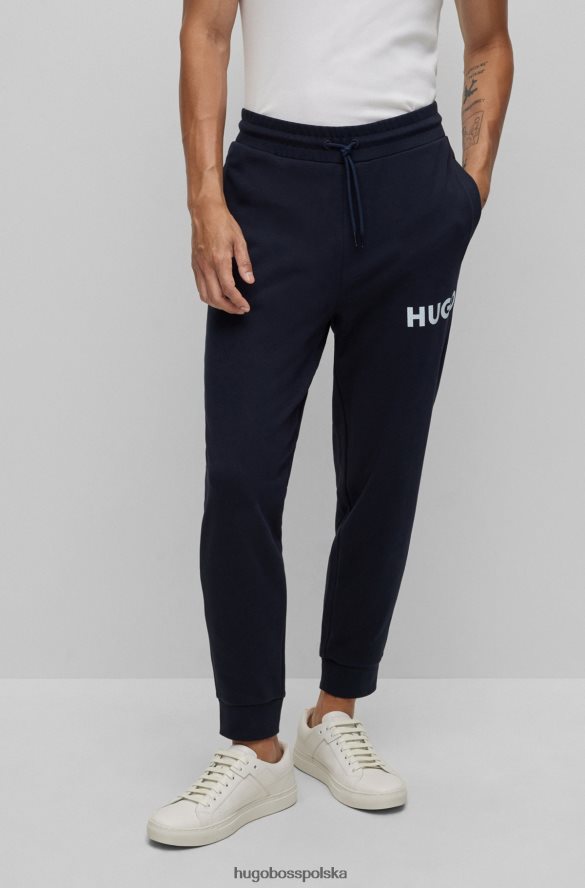 Hugo Boss Spodnie dresowe z bawełny frotte z logo w kolorze ciemnoniebieskim hugo ciemny niebieski R0X0H62576