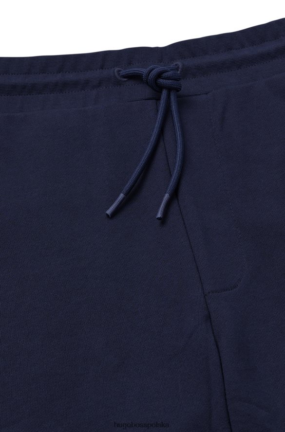 Hugo Boss Spodnie dresowe z bawełny frotte z logo w kolorze ciemnoniebieskim hugo ciemny niebieski R0X0H62576