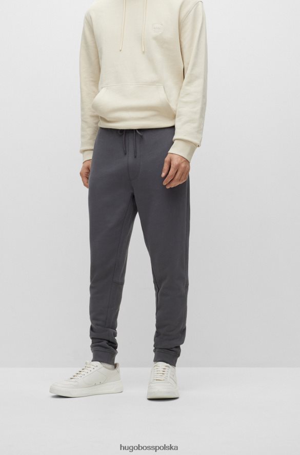 Hugo Boss Spodnie dresowe z bawełny frotte z naszywką z logo w kolorze ciemnoszarym hugo ciemno szary R0X0H61439