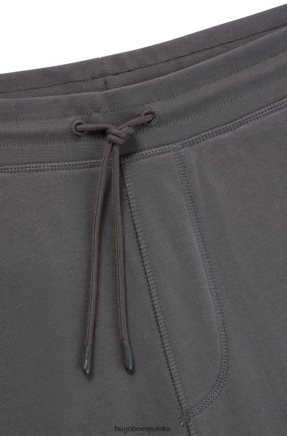 Hugo Boss Spodnie dresowe z bawełny frotte z naszywką z logo w kolorze ciemnoszarym hugo ciemno szary R0X0H61439