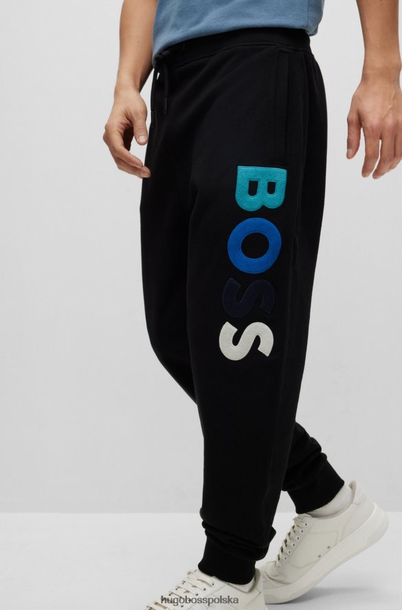Hugo Boss Spodnie dresowe z bawełny frotte z polarowym logo hugo w kolorze czarnym czarny R0X0H63468