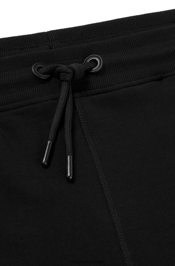 Hugo Boss Spodnie dresowe z bawełny frotte z polarowym logo hugo w kolorze czarnym czarny R0X0H63468