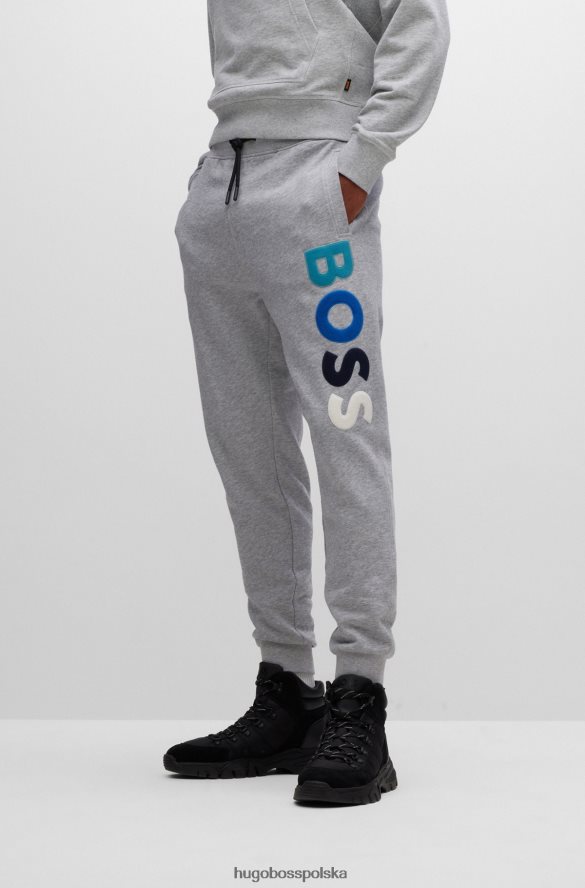 Hugo Boss Spodnie dresowe z jasnoszarej bawełny frotte z polarowym logo hugo jasnoszary R0X0H63469
