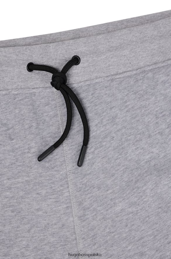 Hugo Boss Spodnie dresowe z jasnoszarej bawełny frotte z polarowym logo hugo jasnoszary R0X0H63469
