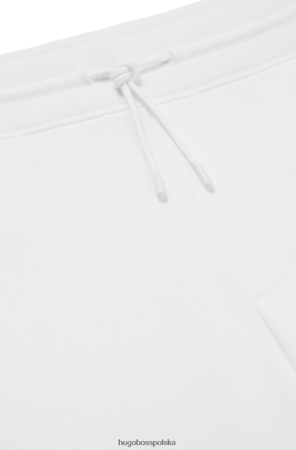 Hugo Boss Spodnie dresowe z mankietami z frotte z odręcznym logo w kolorze białym hugo biały R0X0H64428