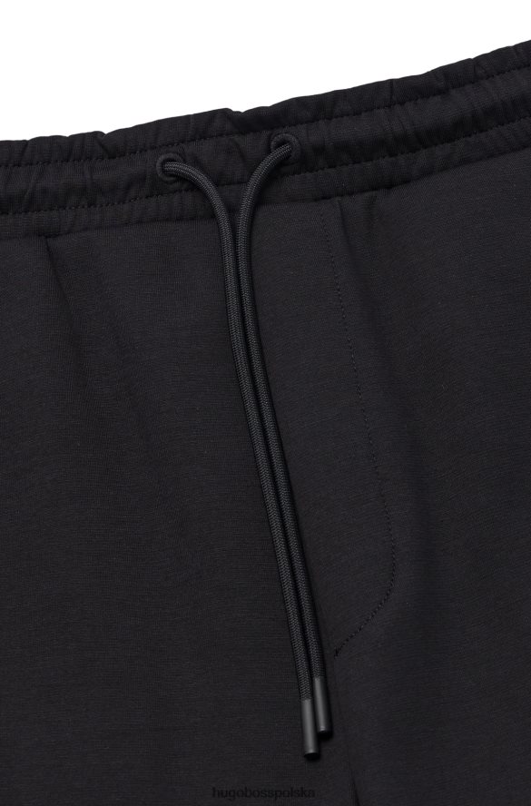 Hugo Boss Spodnie dresowe z mieszanki bawełny z grafiką w kratkę w kolorze czarnym hugo czarny R0X0H61135
