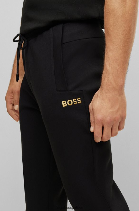 Hugo Boss Spodnie dresowe z mieszanki bawełny z kontrastowym logo w kolorze czarnym hugo czarny R0X0H62786