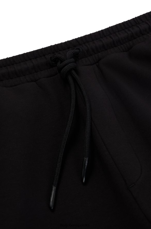 Hugo Boss Spodnie dresowe z mieszanki bawełny z kontrastowym logo w kolorze czarnym hugo czarny R0X0H62786