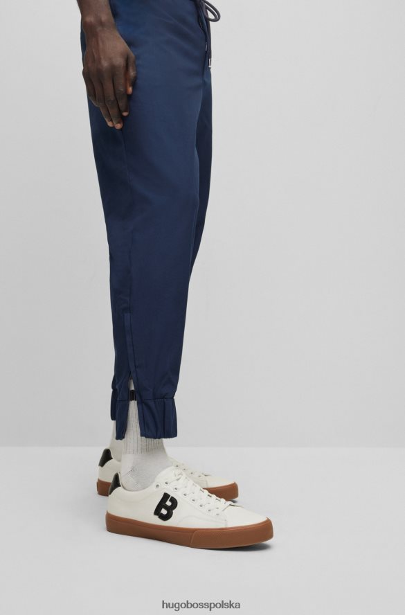 Hugo Boss Spodnie dresowe z mieszanki bawełny, z zapinanymi nogawkami, hugo ciemnoniebieskie ciemny niebieski R0X0H63401