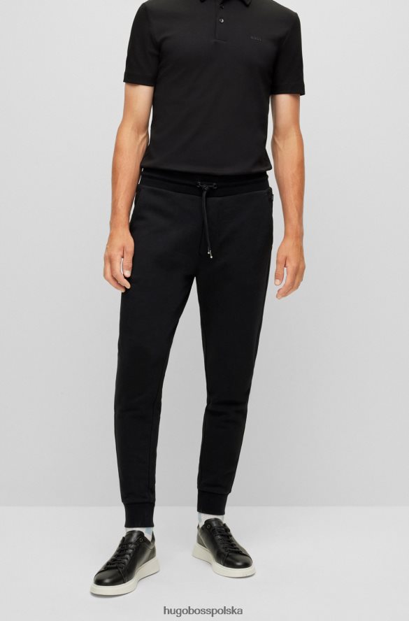 Hugo Boss Spodnie dresowe z organicznej bawełny z gumowanym nadrukiem logo, czarne hugo czarny R0X0H63031