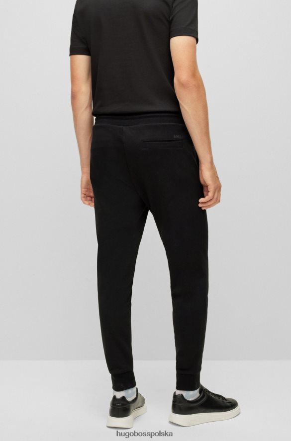 Hugo Boss Spodnie dresowe z organicznej bawełny z gumowanym nadrukiem logo, czarne hugo czarny R0X0H63031