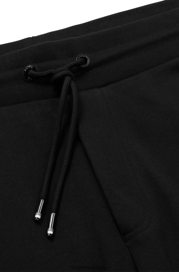 Hugo Boss Spodnie dresowe z organicznej bawełny z gumowanym nadrukiem logo, czarne hugo czarny R0X0H63031