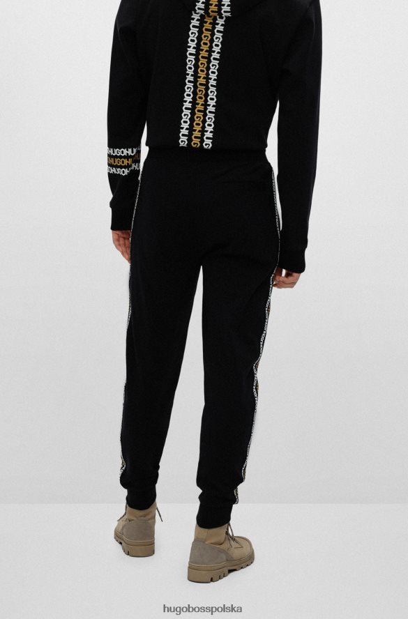 Hugo Boss Zapinane na zamek bawełniane spodnie dresowe z detalami z logo hugo w kolorze czarnym czarny R0X0H64350