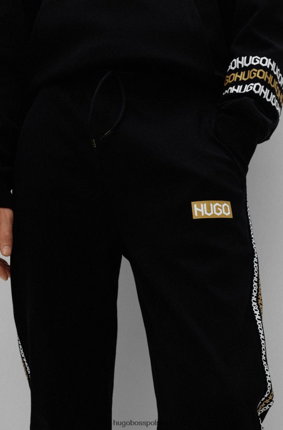 Hugo Boss Zapinane na zamek bawełniane spodnie dresowe z detalami z logo hugo w kolorze czarnym czarny R0X0H64350