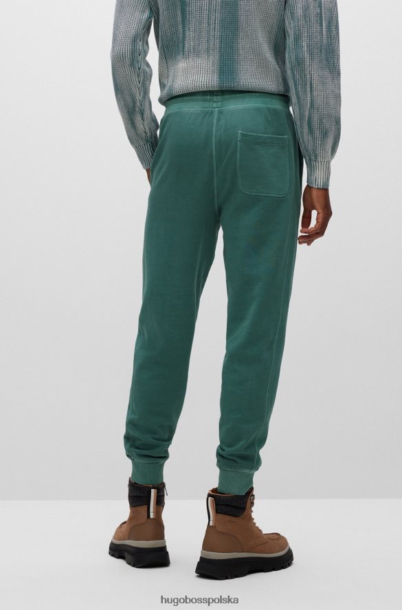 Hugo Boss Zielone spodnie dresowe hugo o swobodnym kroju z bawełny frotte zielony R0X0H64216