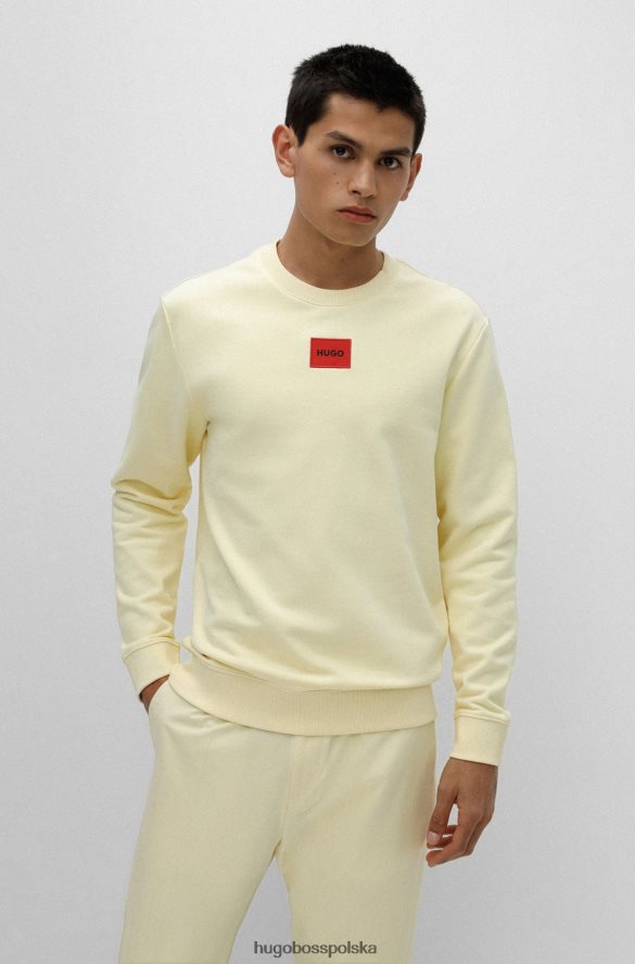 Hugo Boss bawełniana bluza frotte z czerwoną metką z logo hugo jasnożółta jasny zółty R0X0H63245