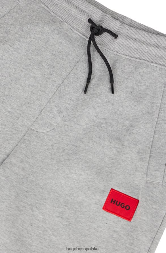 Hugo Boss bawełniane spodnie dresowe z czerwoną naszywką z logo w kolorze ciemnoszarym hugo ciemno szary R0X0H62080