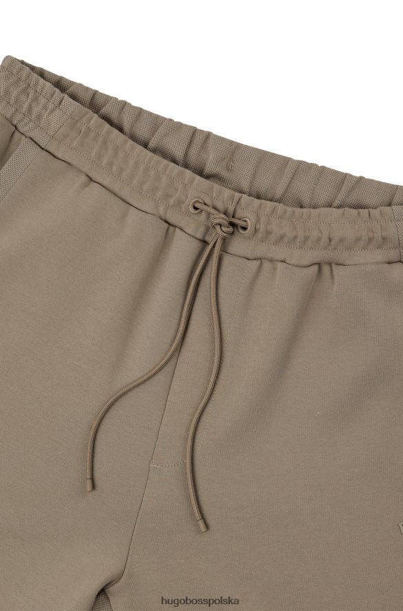 Hugo Boss bawełniane spodnie dresowe z zakrzywionym logo hugo w kolorze beżowym beżowy R0X0H62534