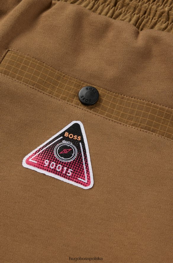 Hugo Boss brązowe spodnie dresowe z mankietami i tonalnymi wstawkami hugo brązowy R0X0H63828