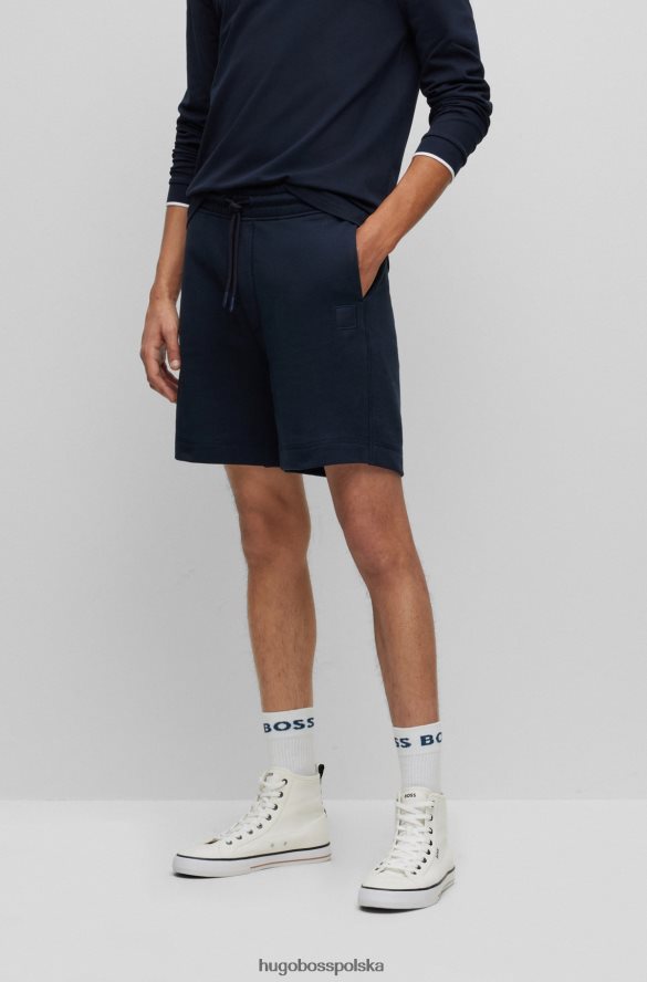 Hugo Boss ciemnoniebieskie spodenki ze sznurkiem, wykonane z bawełny frotte, z naszywką z logo hugo ciemny niebieski R0X0H63933