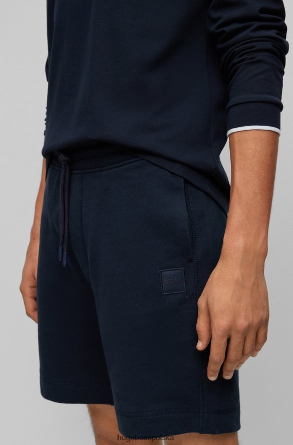 Hugo Boss ciemnoniebieskie spodenki ze sznurkiem, wykonane z bawełny frotte, z naszywką z logo hugo ciemny niebieski R0X0H63933