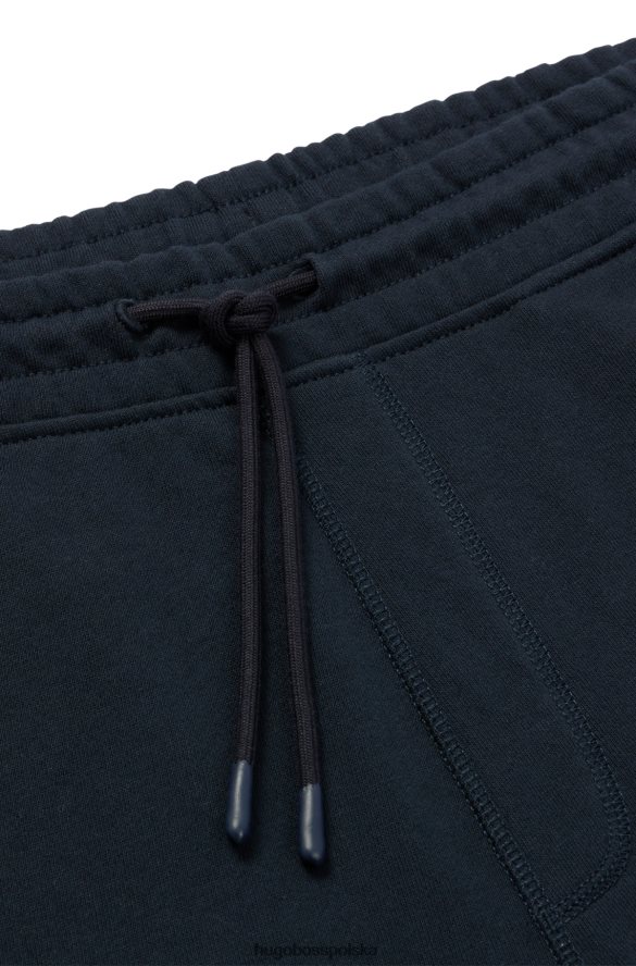 Hugo Boss ciemnoniebieskie spodenki ze sznurkiem, wykonane z bawełny frotte, z naszywką z logo hugo ciemny niebieski R0X0H63933
