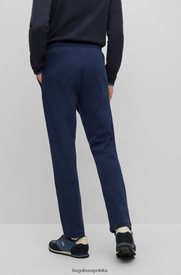 Hugo Boss ciemnoniebieskie spodnie dresowe hugo z mieszanych materiałów z zakrzywionym logo ciemny niebieski R0X0H61611