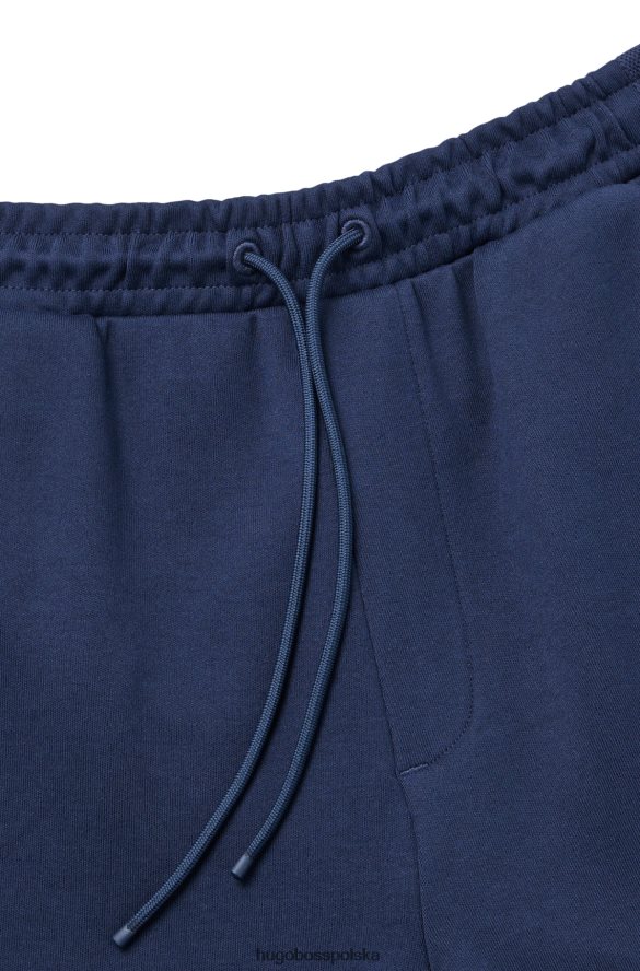 Hugo Boss ciemnoniebieskie spodnie dresowe hugo z mieszanych materiałów z zakrzywionym logo ciemny niebieski R0X0H61611