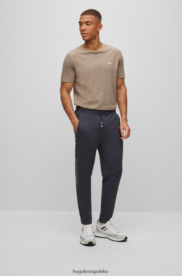Hugo Boss ciemnoniebieskie spodnie dresowe o regularnym kroju ze wstawkami z logo hugo ciemny niebieski R0X0H62432