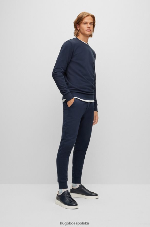 Hugo Boss ciemnoniebieskie spodnie dresowe z bawełny organicznej z gumowanym nadrukiem logo hugo ciemny niebieski R0X0H63032