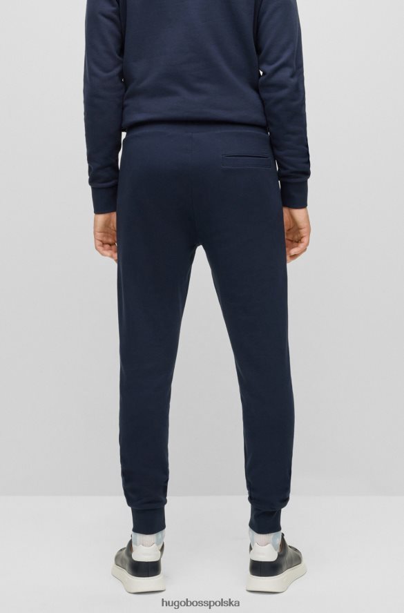 Hugo Boss ciemnoniebieskie spodnie dresowe z bawełny organicznej z gumowanym nadrukiem logo hugo ciemny niebieski R0X0H63032