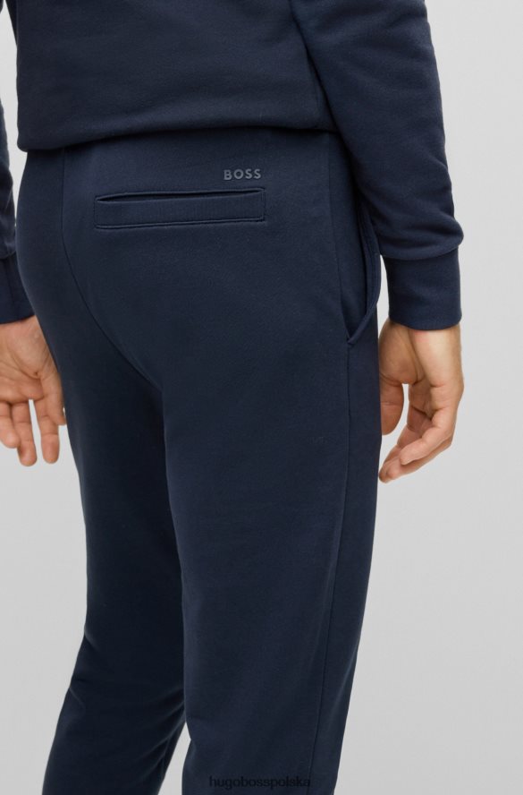 Hugo Boss ciemnoniebieskie spodnie dresowe z bawełny organicznej z gumowanym nadrukiem logo hugo ciemny niebieski R0X0H63032
