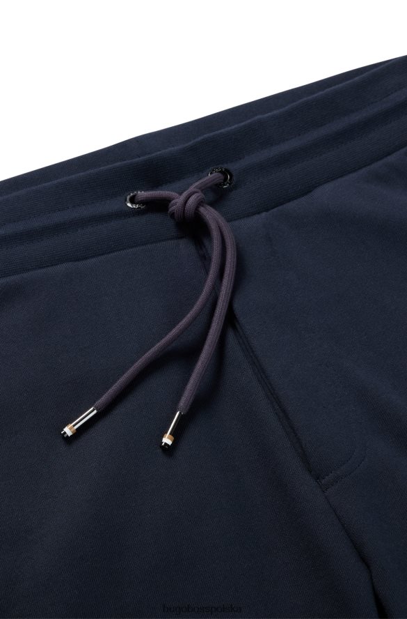 Hugo Boss ciemnoniebieskie spodnie dresowe z bawełny organicznej z gumowanym nadrukiem logo hugo ciemny niebieski R0X0H63032